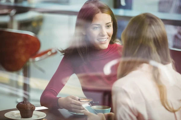 friends chatting over coffee