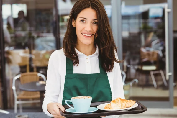 Waitress holding tray — Stock Photo, Image