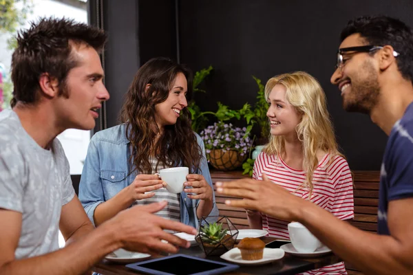 Friends enjoying coffee together — Stock Photo, Image