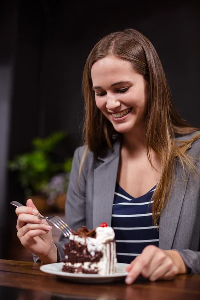 Woman about to eat cake — Stock Photo, Image