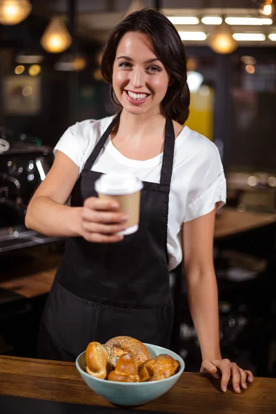 Barista holding disposable cup — Stock Photo, Image