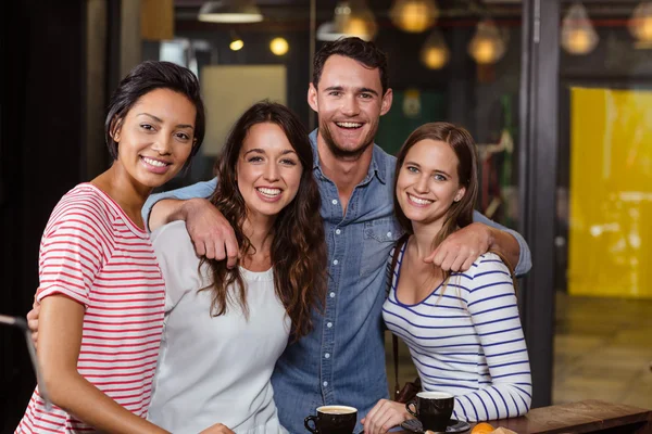 Smiling friends having coffee — Stock Photo, Image