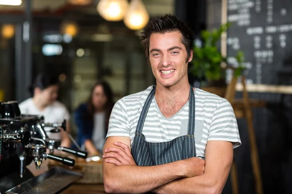 Smiling barista with arms crossed — Stock Photo, Image