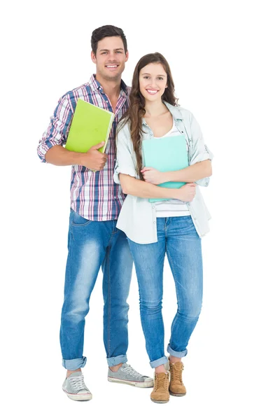 Portrait of students couple holding books — Stock Photo, Image