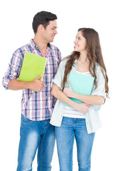 Retrato de estudiantes pareja sosteniendo libros —  Fotos de Stock