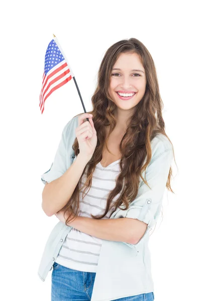 Vrouwelijke student bedrijf Amerikaanse vlag — Stockfoto