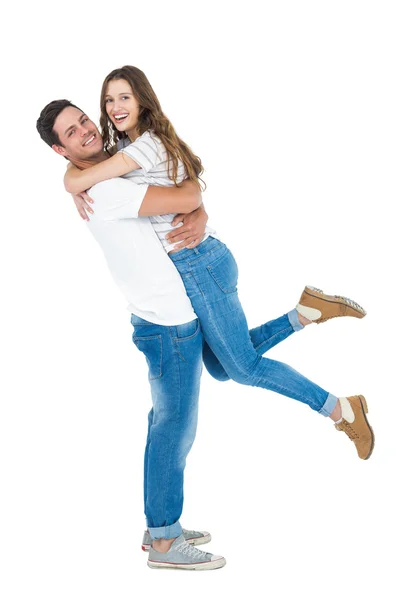 Boyfriend carrying his girlfriend — Stock Photo, Image