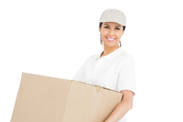 Delivery woman carrying a package — Stock Photo, Image