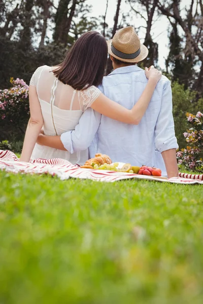 Young couple embracing outdoors — Stock Photo, Image