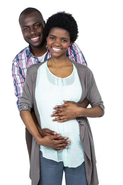 Hombre tocando mujeres embarazadas estómago — Foto de Stock