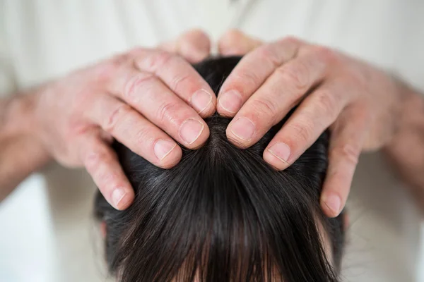 Close-up of woman receiving a head massage — Stock Photo, Image