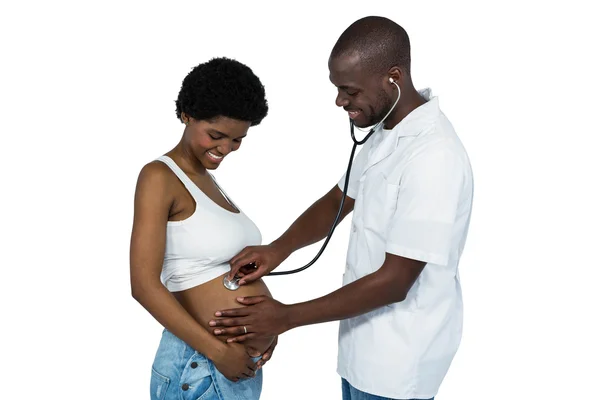 Dokter onderzoekt een zwangere vrouw — Stockfoto