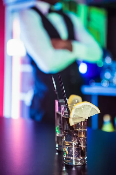 Two glasses of gin on bar counter — Stock Photo, Image