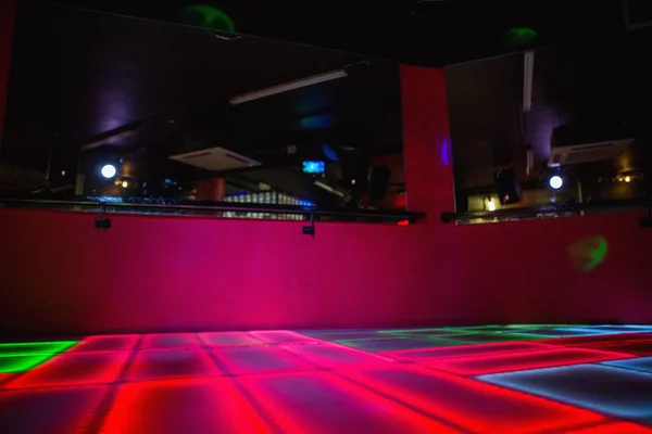 Red illuminated disco dance floor — Stock Photo, Image