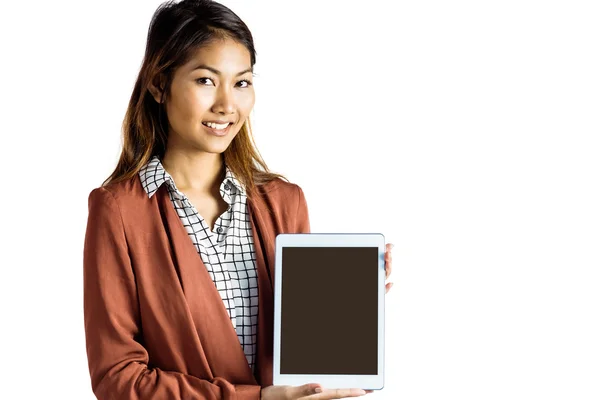 Glimlachende zakenvrouw met een tablet — Stockfoto