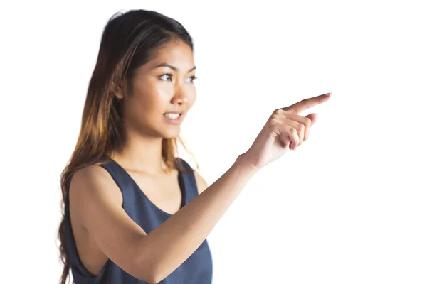 Smiling businesswoman pointing — Stock Photo, Image