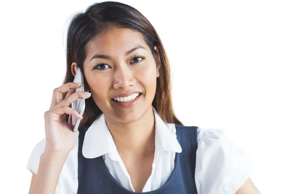 Leende affärskvinna med ett telefonsamtal — Stockfoto