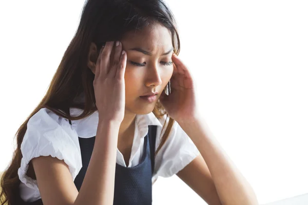 Businesswoman holding her head — Stock Photo, Image