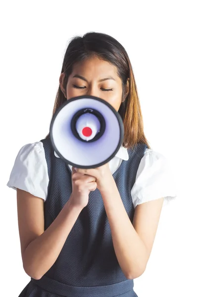 Mulher de negócios atirando através de um megafone — Fotografia de Stock