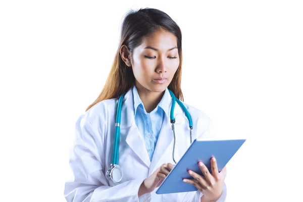 Asian doctor using tablet — Stock Photo, Image