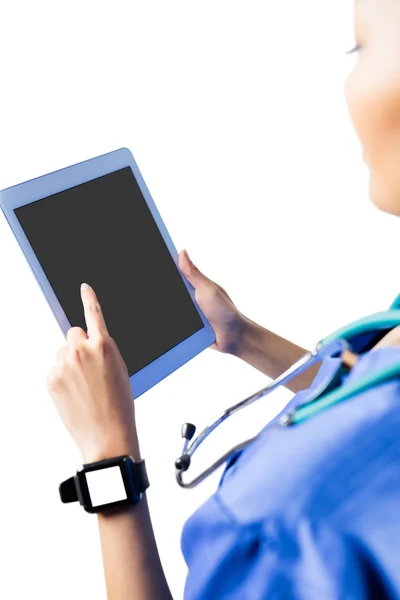 Asian nurse using tablet — Stock Photo, Image