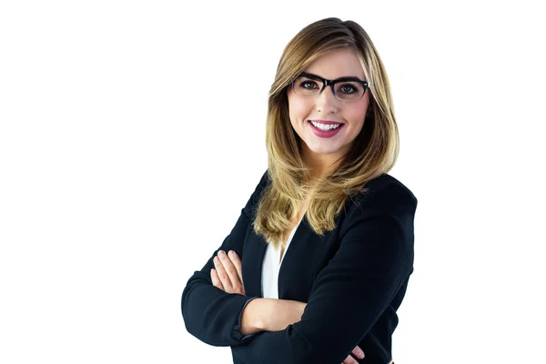 Smiling woman with arms crossed looking at the camera — Stock Photo, Image