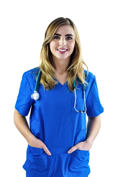 Uśmiechnięte pielęgniarki patrząc na kamery — Zdjęcie stockowe