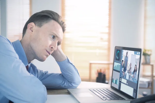 Businessman looking at laptop — Stock Photo, Image