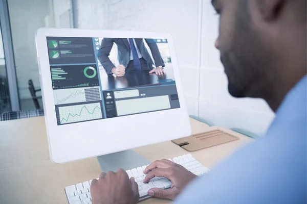 Businessman using computer at desk — Stock Photo, Image