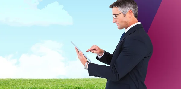 Businessman touching tablet — Stock Photo, Image