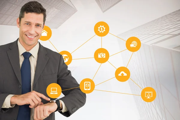 Businessman showing his watch — Stock Photo, Image