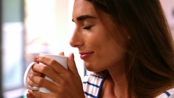 Woman drinking coffee — Stock Video