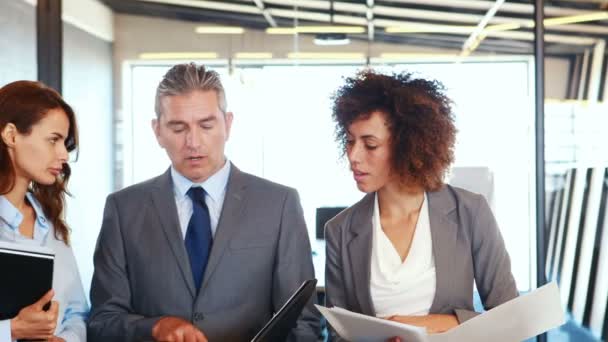 Business team standing together discussing work — Stock Video