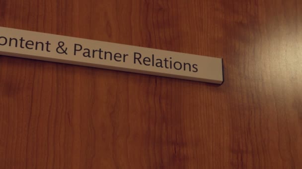 Door sign content and partner relations — Stock Video