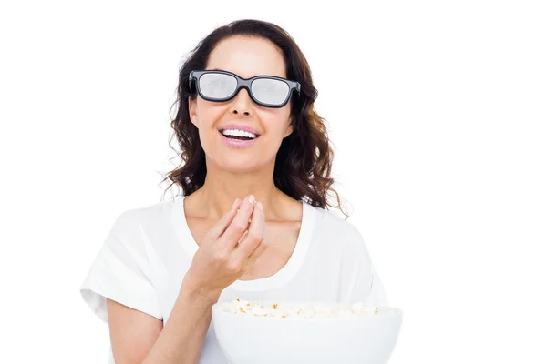 Pretty  eating popcorn — Stock Photo, Image