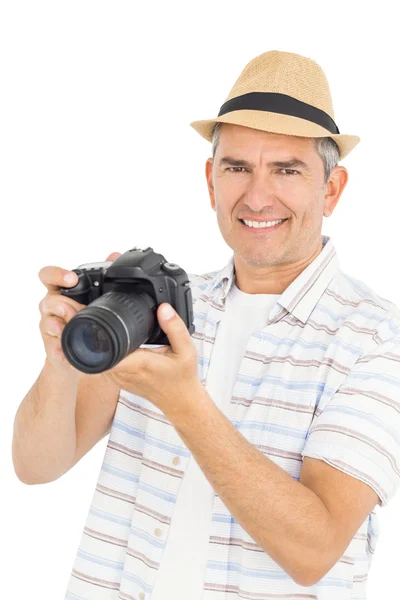 Bonito homem segurando câmera — Fotografia de Stock