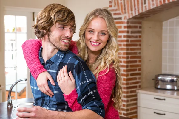 Girlfriend sitting on the counter — Stock Photo, Image