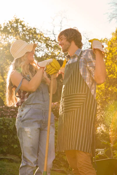 Smiling couple in the garden — Stock Photo, Image