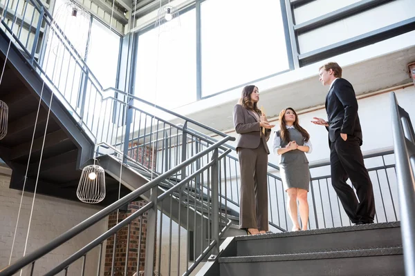 Three executives standing — Stock Photo, Image