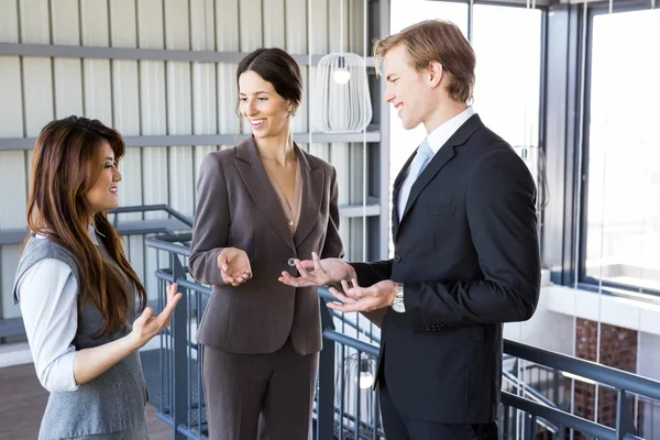 Businesspeople discussing in office — Stock Photo, Image