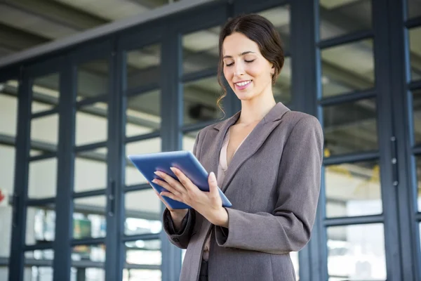 Business woman using on digital tablet — стоковое фото