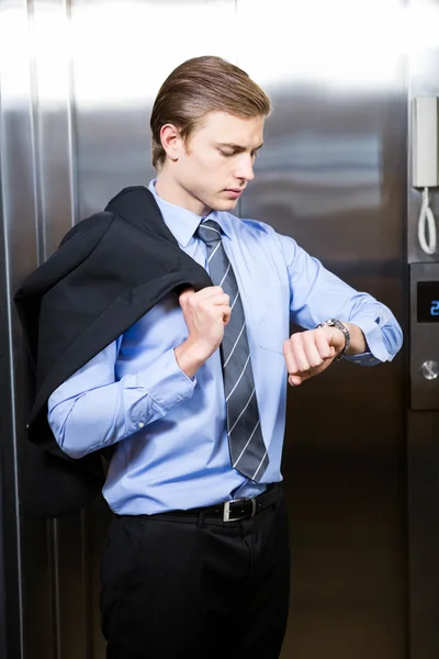 Businessman checking time — Stock Photo, Image