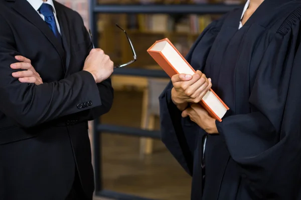 Lawyer holding a law book — Stock Photo, Image