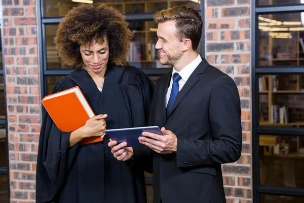 Lawyer looking at digital tablet — Stock Photo, Image