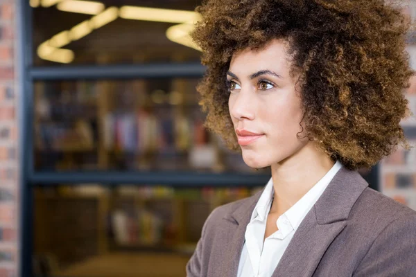 Businesswoman looking away in office — Stock Photo, Image