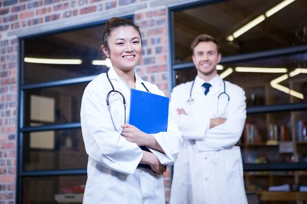 Smiling doctors standing — Stock Photo, Image