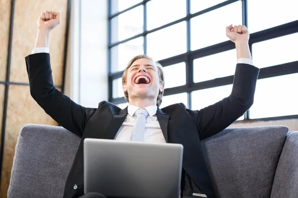 Businessman raising hands — Stock Photo, Image