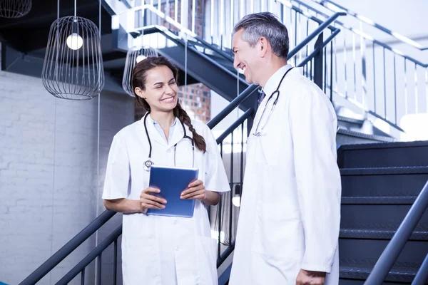 Doctors interacting with each other — Stock Photo, Image