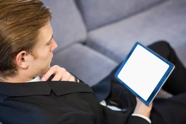 Businessman using digital tablet Stock Image