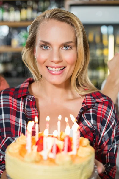 Woman holding cake — Stock Photo, Image